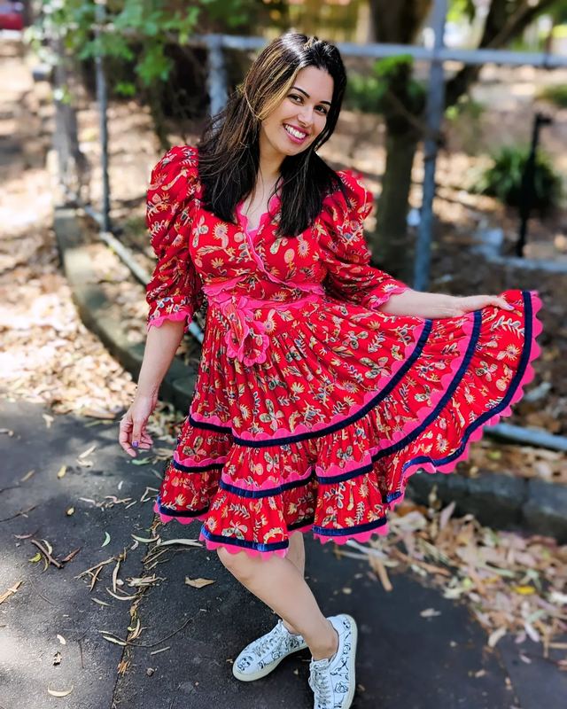 Celia B Red velvet ruffle dress available to rent