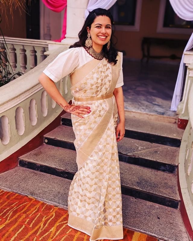 Tilfi Banaras Cream kora silk saree available to rent